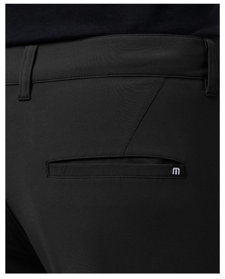 Travis Mathew Open To Close Tech Chino herr byxor, svarta