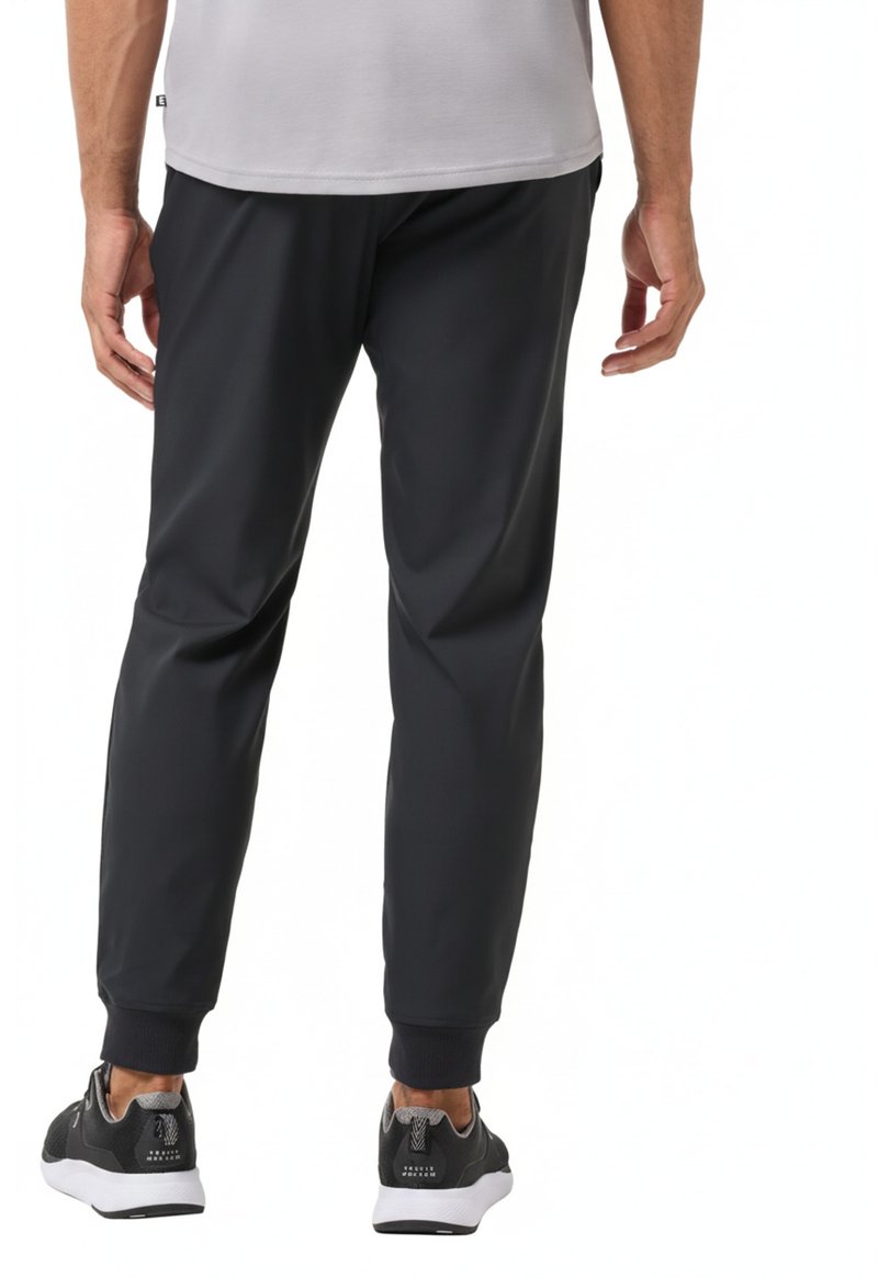 Travis Mathew Open To Close 2.0 Jogger herr byxor, svart