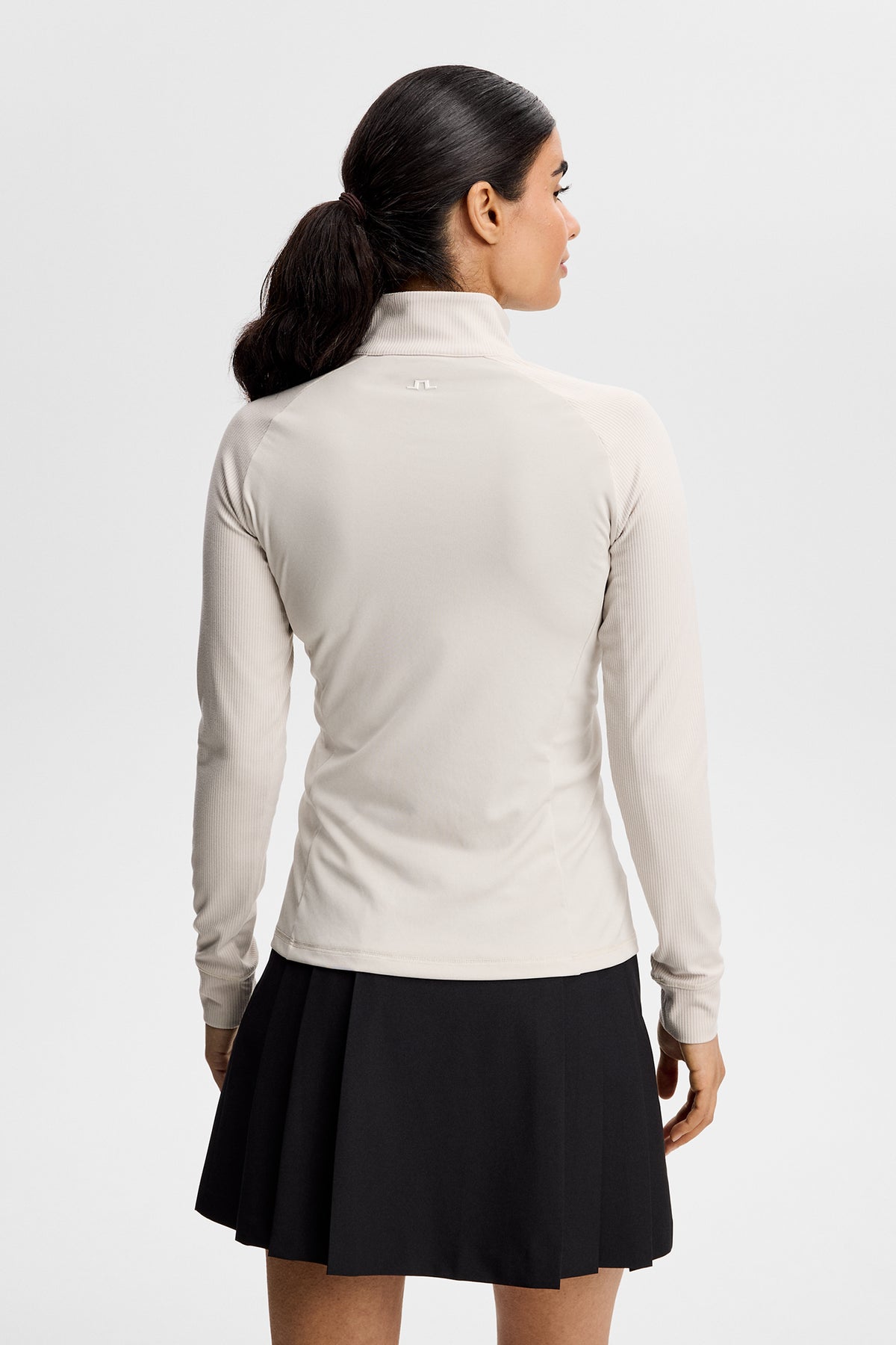 J.Lindeberg Mel Rib Mid Layer Moonbeam – detalj framsida dragkedja och söm