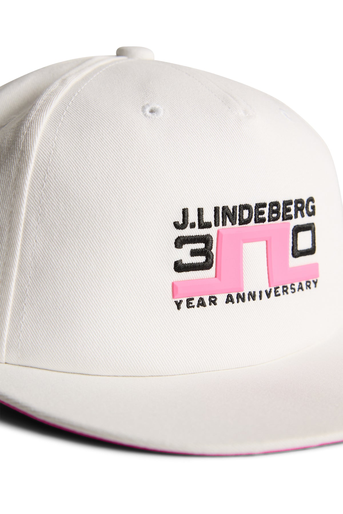 J.Lindeberg 30Y Keps Vit – iögonfallande tryck under skärmen