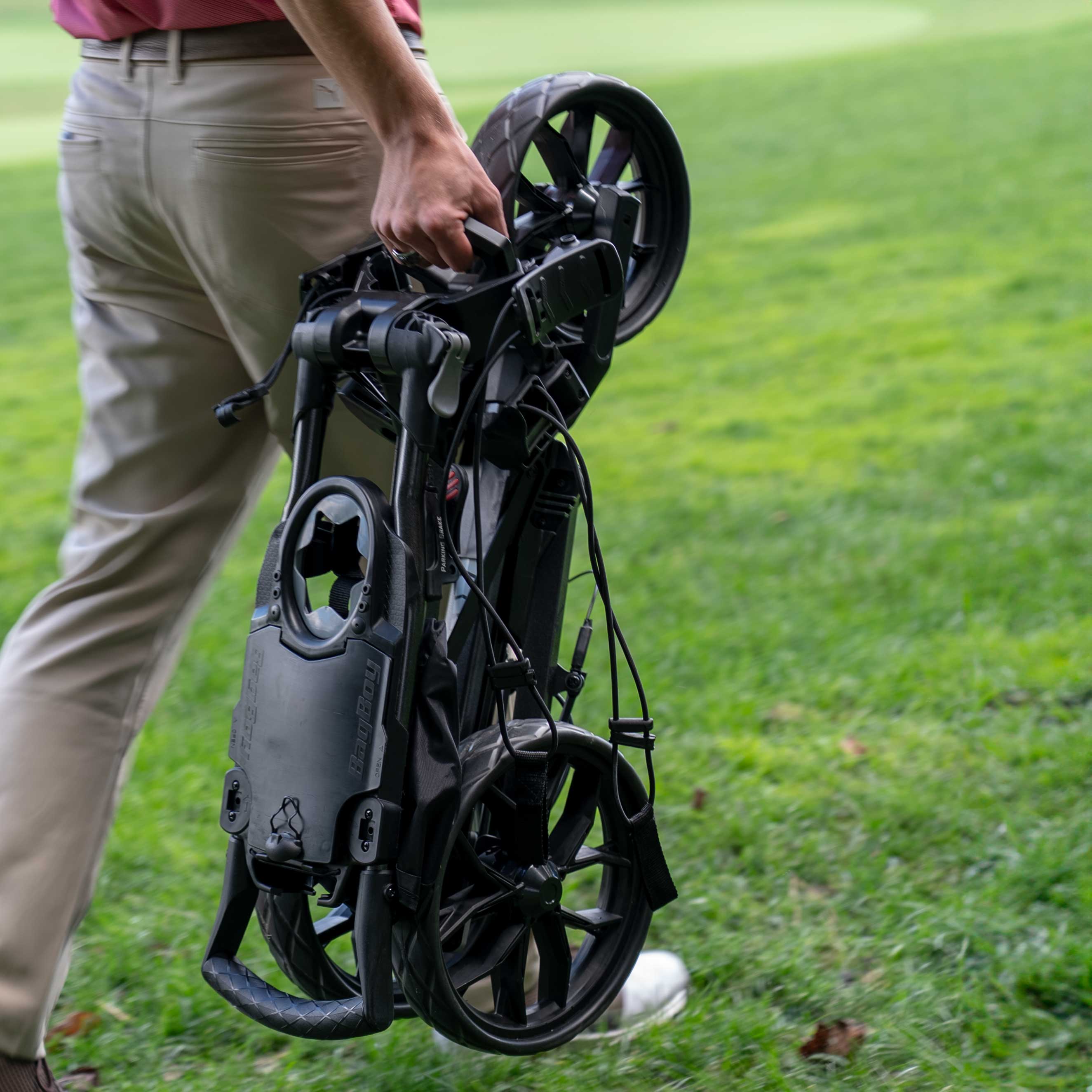 Bag Boy Slimfold lightweight compact push cart on the golf course