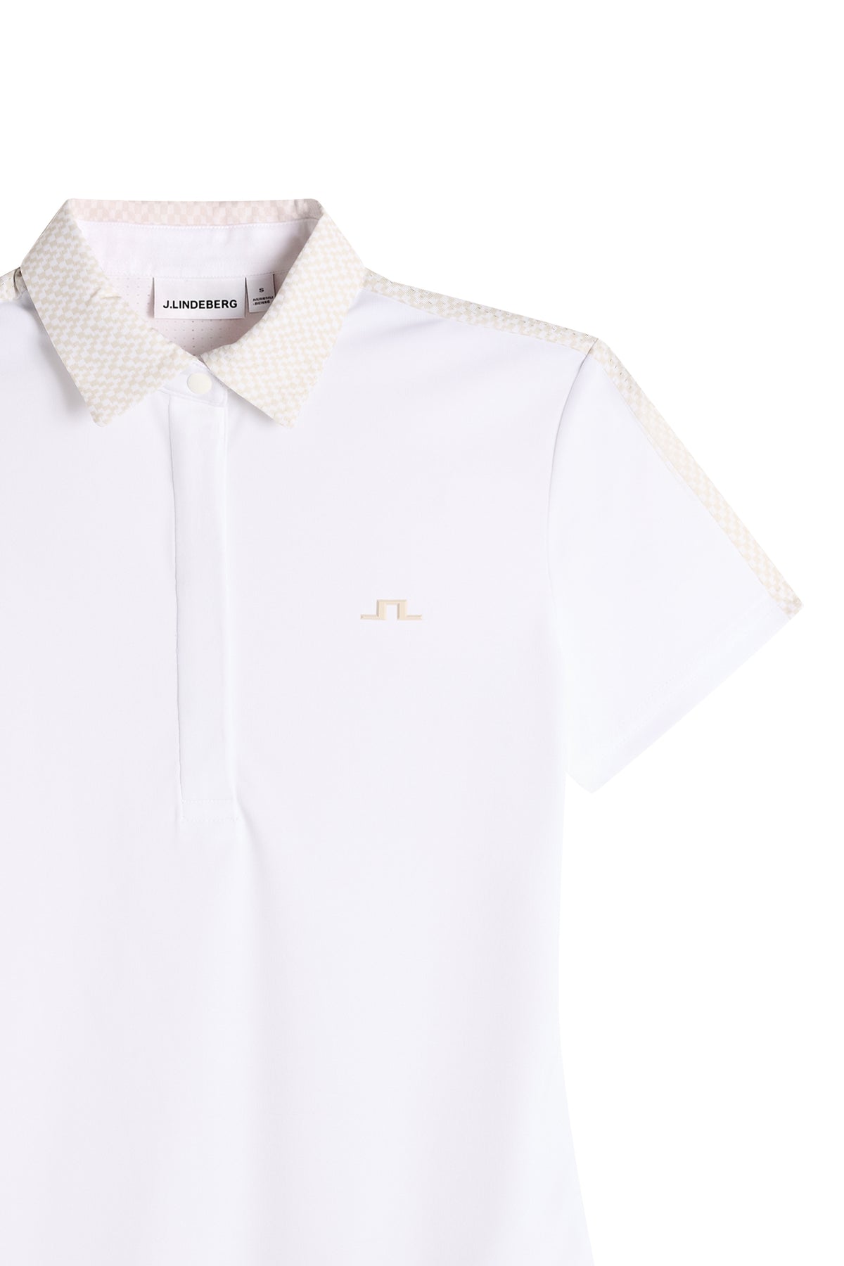 J.Lindeberg Cara Polo Print White – livsstilsbild som visar polon i aktion på banan
