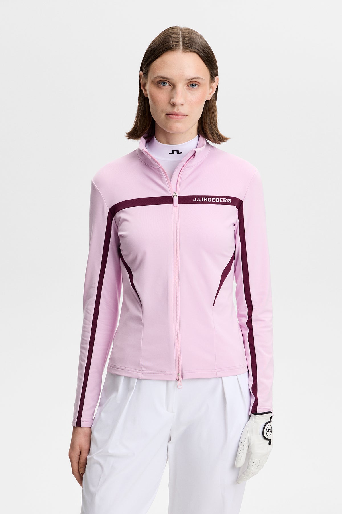 J.Lindeberg Janice Mid Layer Orchid Bouquet – framifrån som visar Light Mid-tyg och tvåvägs dragkedja